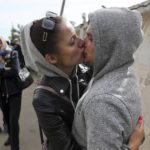 
              FILE A Russian recruit and his wife kiss and hug each other outside a military recruitment center in Volgograd, Russia, Saturday, Sept. 24, 2022. Russian President Vladimir Putin on Wednesday ordered a partial mobilization of reservists to beef up his forces in Ukraine. (AP Photo, File)
            