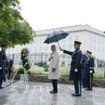 
              President Joe Biden participates in a wreath laying ceremony while visiting the Pentagon in Washington, Sunday, Sept. 11, 2022, to honor and remember the victims of the September 11th terror attack. Standing with the President are Defense Secretary Lloyd Austin and Chairman of the Joint Chiefs, Gen. Mark Milley. (AP Photo/Susan Walsh)
            