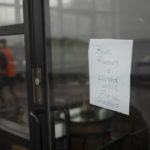 
              A sign in the window of a storefront on the Halifax waterfront is seen ahead of Hurricane Fiona making landfall in Halifax, Friday, Sept. 23, 2022. (Darren Calabrese /The Canadian Press via AP)
            