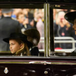 
              Britain's Prince Charlotte, left, Prince George, background, and Camilla, the Queen Consort, right, arrive by car ahead of the Queen Elizabeth II funeral in central London, Monday, Sept. 19, 2022. The Queen, who died aged 96 on Sept. 8, will be buried at Windsor alongside her late husband, Prince Philip, who died last year. (AP Photo/Andreea Alexandru, Pool)
            