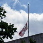
              The Canadian flag is lowered to half-staff over the Canadian Embassy in Washington, Thursday, Sept. 8, 2022, after Queen Elizabeth II, Britain's longest-reigning monarch and a rock of stability across much of a turbulent century, died Thursday after 70 years on the throne. She was 96. (AP Photo/Gemunu Amarasinghe)
            