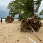 
              Broken umbrellas lay on the beach, felled by Hurricane Fiona in Punta Cana, Dominican Republic, Monday, Sept. 19, 2022. (AP Photo/Ricardo Hernandez)
            