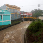 
              A river swollen with rain caused by Hurricane Fiona speeds through Cayey, Puerto Rico, Sunday, Sept. 18, 2022. (AP Photo/Stephanie Rojas)
            