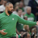 
              FILE - Boston Celtics coach Ime Udoka reacts during the fourth quarter of Game 6 of basketball's NBA Finals against the Golden State Warriors, Thursday, June 16, 2022, in Boston. The Boston Celtics are planning to discipline coach Ime Udoka, likely with a suspension, because of an improper relationship with a member of the organization, two people with knowledge of the matter told The Associated Press on Thursday, Sept. 22, 2022. (AP Photo/Steven Senne, File)
            