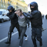 
              Russian policemen detain a demonstrator protesting against mobilization in St. Petersburg, Russia, Saturday, Sept. 24, 2022.  (AP Photo)
            