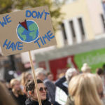 
              Climate activists attend a demonstration in Cologne, Germany, Friday, Sept. 23, 2022. Youth activists staged a coordinated “global climate strike” on Friday to highlight their fears about the effects of global warming and demand more aid for poor countries hit by wild weather. (Marius Becker/dpa via AP)
            