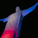 
              The Christ the Redeemer statue is illuminated in red, blue and white, the colors of the flag of The United Kingdom, as a tribute to Queen Elizabeth II on her passing, in Rio de Janeiro, Brazil, Thursday, Sept. 8, 2022. Britain's longest-reigning monarch died Thursday after 70 years on the throne. She was 96. (AP Photo/Bruna Prado)
            