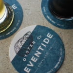 
              This image released by Might & Main shows custom coasters designed for Eventide Oyster Co. in Portland, Maine. (Might & Main via AP)
            