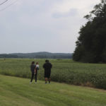 
              Spectators gather as a stolen airplane rests in a field of soybeans after crash-landing near Ripley, Miss., on Saturday, Sept. 3, 2022. Authorities say a man who stole a plane and flew it over Mississippi after threatening to crash it into a Walmart store faces charges of grand larceny and terroristic threats. Tupelo Police Chief John Quaka said Cory Wayne Patterson didn't have a pilot's license but had some flight instruction and was an employee of Tupelo Aviation. (AP Photo/Nikki Boertman)
            