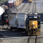 
              File - Locomotives are coupled to railway cars in the Selkirk rail yard Wednesday, Sept. 14, 2022, in Selkirk, N.Y. President Joe Biden said Thursday, Sept. 15, 2022, that a tentative railway labor agreement has been reached, averting a potentially devastating strike before the pivotal midterm elections. (AP Photo/Hans Pennink, File)
            