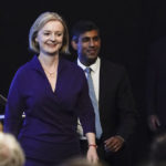 
              Liz Truss, left, and Rishi Sunak arrive for the announcement of the result of the Conservative Party leadership contest at the Queen Elizabeth II centre in London, Monday, Sept. 5, 2022. (AP Photo/Alberto Pezzali)
            