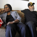 
              FILE - Sarah Collins Rudolph and her husband, George Rudolph, talk in their home on Nov. 16, 2016, in Birmingham, Ala. Rudolph lost an eye and still has slivers of glass inside her body from the racist bombing that killed her sister and three other Black girls inside a church 59 years ago Thursday. She's still waiting on the state to compensate her for those injuries. (AP Photo/Jay Reeves, File)
            
