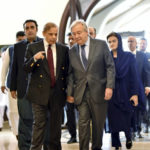 
              In this handout photo released by Pakistan Prime Minister Office, Prime Minister Shahbaz Sharif, left, receives U.N. Secretary-General Antonio Guterres at the Prime Minister House in Islamabad, Pakistan, Friday, Sept. 9, 2022. Guterres appealed to the world to help Pakistan after arriving in the country Friday to see climate-induced devastation from months of deadly record floods that have left half a million people living in tents under the open sky. (Pakistan Prime Minister Office via AP)
            