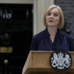 
              New British Prime Minister Liz Truss makes an address outside Downing Street in London, Tuesday, Sept. 6, 2022 after returning from Balmoral in Scotland where she was formally appointed by Britain's Queen Elizabeth II. (AP Photo/Kirsty Wigglesworth)
            