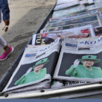 
              Newspapers fronting pictures of Queen Elizabeth II are displayed on a newsstand following her passing, in Jakarta, Indonesia, Friday, Sept. 9, 2022. Queen Elizabeth II, Britain's longest-reigning monarch, died Thursday after 70 years on the throne. She was 96. (AP Photo/Tatan Syuflana)
            