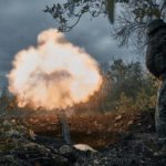 
              Ukrainian soldiers fire the Russian positions with the mortar in Bakhmut, Donetsk region, Ukraine, Friday, Oct. 21, 2022. (AP Photo/LIBKOS)
            
