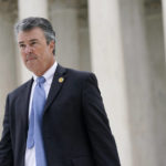 
              Alabama Attorney General Steve Marshall walks across the Supreme Court plaza following oral arguments in Merrill v. Milligan, an Alabama redistricting case that could have far-reaching effects on minority voting power across the United States, on Capitol Hill in Washington, Tuesday, Oct. 4, 2022. (AP Photo/Patrick Semansky)
            