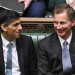 
              In this handout photo provided by UK Parliament, Britain's Prime Minister Rishi Sunak, left, sits next to Chancellor of the Exchequer Jeremy Hunt during Prime Minister's Questions in the House of Commons in London, Wednesday, Oct. 26, 2022. (Jessica Taylor/UK Parliament via AP)
            