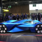 
              Visitors watch the Renault Apine H2 hydrogen-powered concept supercar at the Paris Car Show Monday, Oct. 17, 2022 in Paris. Europe is leading the charge into electric vehicles as battery powered cars break out of their niche market of first adopters and enter the mainstream with increasing market share that's forecast to grow strongly as the EU pushes to phase out internal combustion engine vehicles by 2035 (AP Photo/Michel Euler)
            