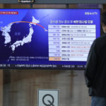 
              A TV screen showing a news program reporting about North Korea's missile launch, is seen at the Seoul Railway Station in Seoul, South Korea, Tuesday, Oct. 4, 2022. North Korea on Tuesday fired an intermediate-range ballistic missile over Japan for the first time in five years, forcing Japan to issue evacuation notices and suspend trains, as the North escalates tests of weapons designed to strike regional U.S. allies. (AP Photo/Lee Jin-man)
            
