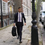 
              Conservative Party leadership candidate Rishi Sunak leaves the campaign office in London, Monday, Oct. 24, 2022. Former British Treasury chief Rishi Sunak is frontrunner in the Conservative Party's race to replace Liz Truss as prime minister. (AP Photo/Aberto Pezzali)
            