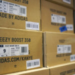 
              Boxes containing Yeezy shoes made by Adidas are seen at Laced Up, a sneaker resale store, in Paramus, N.J., Tuesday, Oct. 25, 2022. Adidas has ended its partnership with the rapper formerly known as Kanye West over his offensive and antisemitic remarks, the latest company to cut ties with Ye and a decision that the German sportswear company said would hit its bottom line. (AP Photo/Seth Wenig)
            