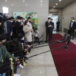 
              South Korean President Yoon Suk Yeol, right, speaks to reporters upon his arrival at the presidential office in Seoul, South Korea, Tuesday, Oct. 11, 2022. South Korea said Tuesday it’s capable of detecting and intercepting the variety of missiles launched in a barrage of recent simulated nuclear attacks on its rivals, though it maintains the North’s advancing nuclear program poses a grave security threat. (Ahn Jung-hwan/Yonhap via AP)
            