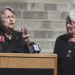 
              Former Kansas Democratic Party Chair and state Revenue Secretary Joan Wagnon, left, speaks during a rally for a new group, Keep Kansas Free, while former Insurance Commissioner Sandy Praeger, right, a Republican, watches on Thursday, Oct. 13, 2022, outside the statehouse in Topeka, Kan. The group formed to urge voters who support abortion rights to back like-minded candidates and retain Kansas Supreme Court justices on the bench as ways to protect abortion access. (AP Photo/John Hanna)
            
