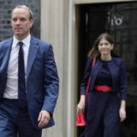 
              Dominic Raab, the Deputy Prime Minister, left, leaves 10 Downing Street after a Cabinet meeting the first held by the new British Prime Minister Rishi Sunak in London, Wednesday, Oct. 26, 2022. Sunak was elected by the ruling Conservative party to replace Liz Truss who resigned. (AP Photo/Kirsty Wigglesworth)
            