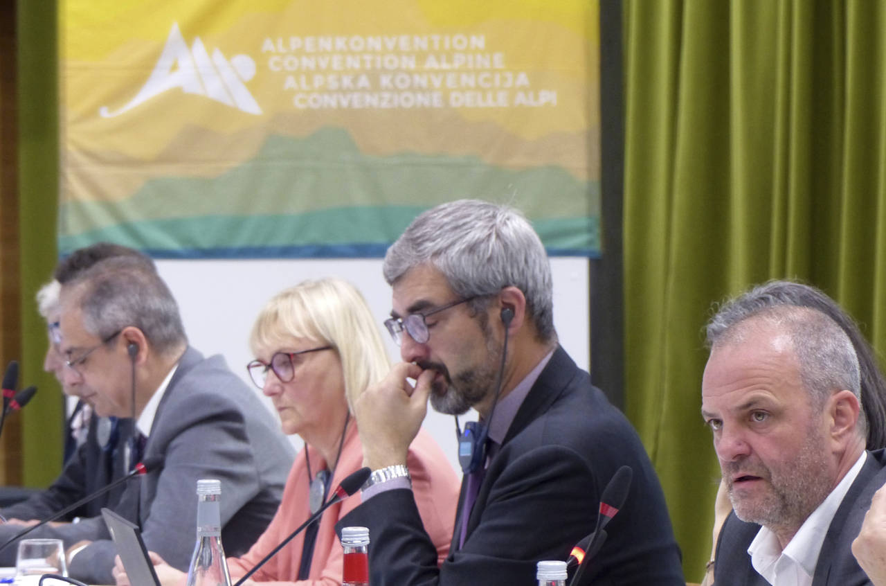 Environment Minister Uros Brezan of Slovenia, right, speaks to envoys from seven other European cou...