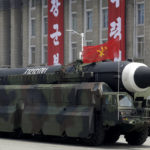 
              FILE - A missile that analysts believe could be the North Korean Hwasong-12 is paraded across Kim Il Sung Square in Pyongyang on April 15, 2017. North Korea on Tuesday, Oct. 4, 2022 fired an intermediate-range ballistic missile over Japan for the first time in five years. Japanese Defense Minister Yasukazu Hamada said one launched Tuesday could be the same as the Hwasong-12 missile that North has fired four times in the past. (AP Photo/Wong Maye-E, File)
            