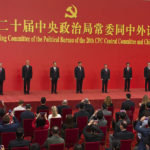 
              New members of the Politburo Standing Committee, from left, Li Xi, Cai Qi, Zhao Leji, President Xi Jinping, Li Qiang, Wang Huning, and Ding Xuexiang are introduced at the Great Hall of the People in Beijing, Sunday, Oct. 23, 2022. (AP Photo/Ng Han Guan)
            
