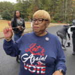 
              Helen Butler, executive director of The Georgia Coalition for the People's Agenda, speaks to organizers at a Black church tradition event known as "Souls to the Polls," in Decatur, Ga., Sunday, Oct. 30, 2022. (AP Photo/Sudhin Thanawala)
            