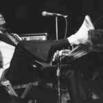 
              CORRECTS LOCATION OF DEATH TO DESOTO COUNTY, MISSISSIPPI - FILE - Jerry Lee Lewis props his foot on the piano as he lays back and acknowledges the applause of fans during the fifth annual Rock 'n' Roll Revival at New York's Madison Square Garden on March 14, 1975. Spokesperson Zach Furman said Lewis died Friday morning, Oct. 28, 2022, at his home in DeSoto County, Miss., south of Memphis, Tenn. He was 87. (AP Photo/Rene Perez, File)
            