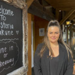 
              Teresa Mochan, restaurant manager and shareholder at the Osteria restaurant in Ohakune, New Zealand poses for a photo on Sept. 22, 2022. New Zealand's Turoa ski field is usually a white wonderland at this time of year, its deep snowpack supporting its famed spring skiing. But this season it remains a barren moonscape, with tiny patches of snow poking out between vast fields of jagged volcanic boulders. (AP Photo/Nick Perry)
            