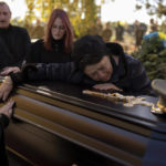 
              Tatiana Alexeyevna mourns over the coffin of her soon Colonel Oleksiy Telizhenko during his funeral in Bucha, near in Kyiv, Ukraine, Tuesday, Oct. 18, 2022. In March, Colonel Oleksiy was abducted by Russian soldiers from his home in Bucha, six months later his body was found with signals of torture buried in a forest not far away from his village. (AP Photo/Emilio Morenatti)
            