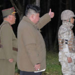 
              In this photo provided on Oct. 10, 2022, by the North Korean government, North Korean leader Kim Jong Un, center, inspects what it says a ballistic missile test held during  Sept. 25 and Oct. 9, 2022 at an undisclosed location in North Korea. Independent journalists were not given access to cover the event depicted in this image distributed by the North Korean government. The content of this image is as provided and cannot be independently verified. (Korean Central News Agency/Korea News Service via AP)
            