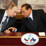 
              FILE - Italian former Premier Silvio Berlusconi, right, and Russian Prime Minister Vladimir Putin talk during a press conference at Villa Gernetto, in Gerno, near Milan, Italy, Monday April 26, 2010. Just in time to celebrate his 86th birthday, Italy's former premier Silvio Berlusconi is making his return to Italy's parliament, winning a seat in the Senate nearly a decade after being banned from public office over a tax fraud conviction. (AP Photo/Luca Bruno, file)
            