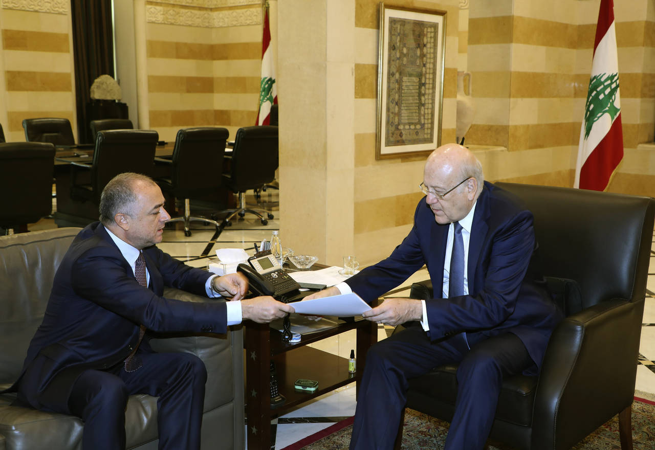 In this photo released by Lebanon's official government photographer Dalati Nohra, Lebanese Prime M...