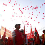 
              Participants let go of red balloons to celebrate mainland China's National Day at an event organized by the Taiwan People Communist Party in Tainan in southern Taiwan on Saturday, Oct 1, 2022. In Taiwan, which Beijing claims as part of its territory, a group of activists who call themselves the Taiwan People Communist Party raised the Chinese flag in the southern city of Tainan during the National Day of mainland China and chanted, "Long live the Motherland." (AP photo/I-Hwa Cheng)
            