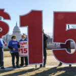 
              FILE - Activists appeal for a $15 minimum wage near the Capitol in Washington, Thursday, Feb. 25, 2021. According to the Economic Policy Institute, the federal minimum wage in 2021 was worth 34% less than in 1968, when its purchasing power peaked. (AP Photo/J. Scott Applewhite, File)
            