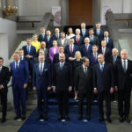 
              European Union leaders pose for a group photo during an EU Summit at Prague Castle in Prague, Czech Republic, Friday, Oct 7, 2022. European Union leaders converged on Prague Castle Friday to try to bridge significant differences over a natural gas price cap as winter approaches and Russia's war on Ukraine fuels a major energy crisis. Front row left, to right, European Parliament President Roberta Metsola, French President Emmanuel Macron, Romania's President Klaus Werner Ioannis, Czech Republic's Prime Minister Petr Fiala, European Council President Charles Michel, Cypriot President Nicos Anastasiades, Bulgaria's President Rumen Radev, Lithuania's President Gitanas Nauseda and European Commission President Ursula von der Leyen. (AP Photo/Petr David Josek)
            