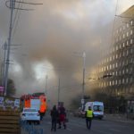 
              FILE- Smoke rises after a drone fired on buildings in Kyiv, Ukraine, Monday, Oct. 17, 2022. Surovikin has become the face of Russia’s new strategy in Ukraine, which includes unleashing a barrage of strikes against the country's infrastructure. (AP Photo/Efrem Lukatsky, File)
            