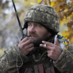 
              A Ukrainian officer gives commands during the battle in the front line near Bakhmut, in the Donetsk region, Ukraine, Thursday, Oct. 27, 2022. (AP Photo/Efrem Lukatsky)
            