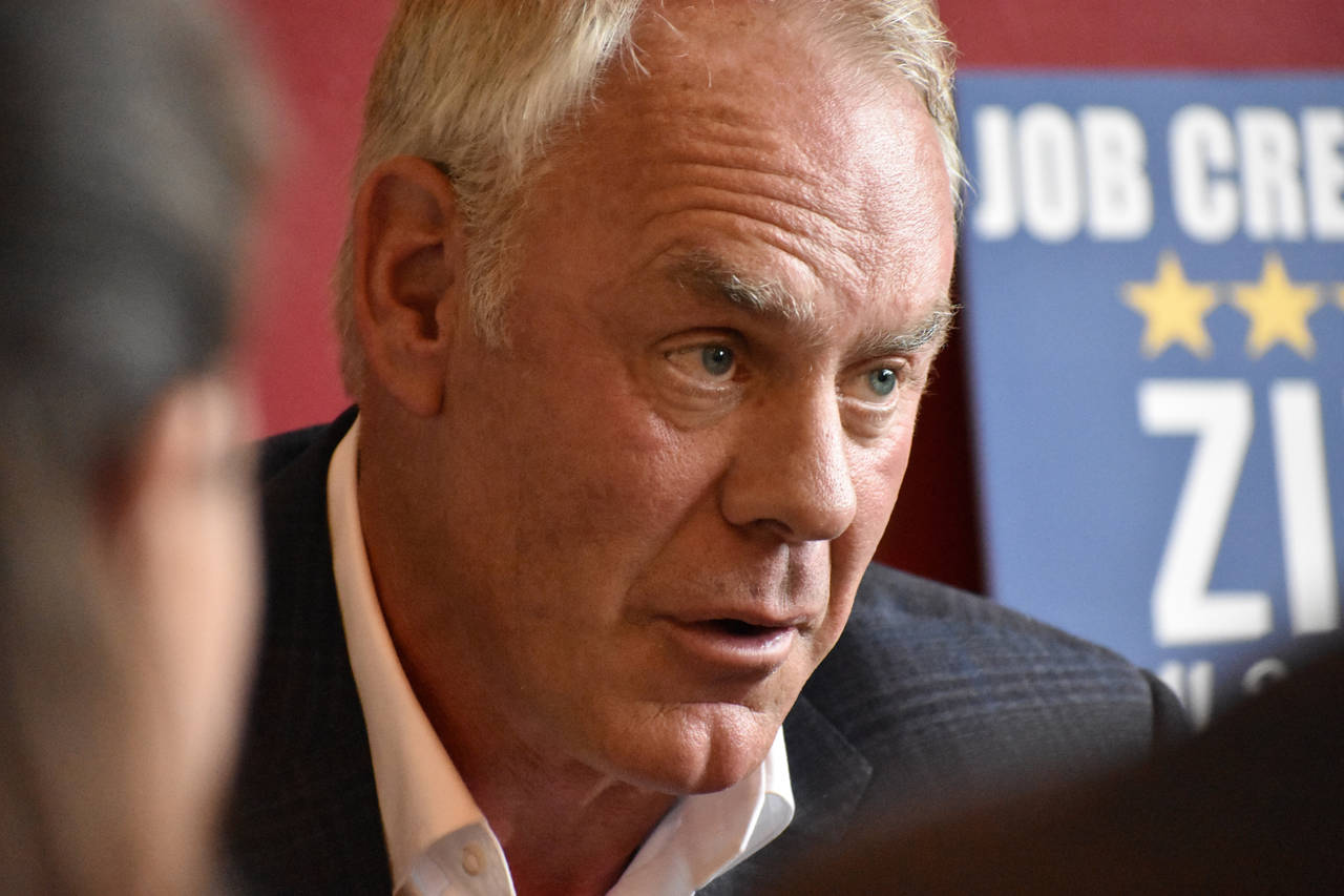 Republican U.S. House candidate Ryan Zinke speaks to business community members during a meeting at...