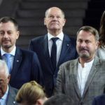 
              Germany's Chancellor Olaf Scholz, center, poses with other EU leaders prior to a group photo during an EU Summit at Prague Castle in Prague, Czech Republic, Friday, Oct 7, 2022. European Union leaders converged on Prague Castle Friday to try to bridge significant differences over a natural gas price cap as winter approaches and Russia's war on Ukraine fuels a major energy crisis. Leaders from left, Slovenia's Prime Minister Robert Golob, Slovakia's Prime Minister Eduard Heger, Portugal's Prime Minister Antonio Costa, Luxembourg's Prime Minister Xavier Bettel, Finland's Prime Minister Sanna Marin and Poland's Prime Minister Mateusz Morawiecki. (AP Photo/Petr David Josek)
            