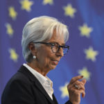 Christine Lagarde, President of the European Central Bank (ECB), gives a press conference at ECB headquarters in Frankfurt, Germany, Thursday, Oct. 27, 2022. The European Central Bank has made another outsized interest rate hike aimed at squelching out-of-control inflation. It increased rates by three-quarters of a percentage point Thursday at a meeting in Frankfurt.  (Arne Dedert/dpa via AP)