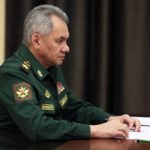 
              Russian Defense Minister Sergei Shoigu speaks to Russian President Vladimir Putin, right, listens to Russian President Vladimir Putin during their meeting at the Novo-Ogaryovo residence outside Moscow, Russia, Friday, Oct. 28, 2022. (Mikhail Metzel, Sputnik, Kremlin Pool Photo via AP)
            