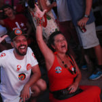 
              Supporters of Brazil's former President Luiz Inacio Lula da Silva, celebrate partial results after polls closed in the country's presidential run-off election, in Rio de Janeiro, Brazil, Sunday, Oct. 30, 2022.  On Sunday, Brazilians had to choose between da Silva and incumbent Jair Bolsonaro, after neither got enough support to win outright in the Oct. 2 general election. (AP Photo/Bruna Prado)
            