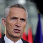 
              NATO Secretary General Jens Stoltenberg answers to reporters as he arrives for a meeting of NATO defense ministers at NATO headquarters in Brussels, Wednesday, Oct. 12, 2022. (AP Photo/Olivier Matthys)
            